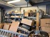 a room filled with lots of boxes and a firetruck