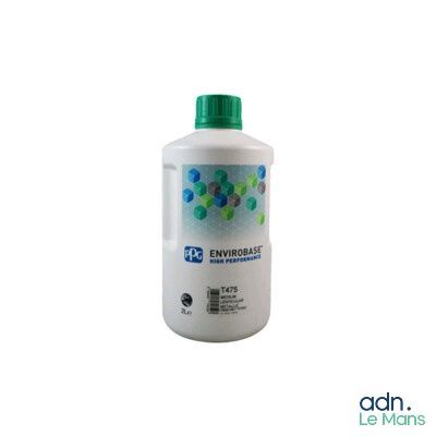 une bouteille de liquide surmontée d'un bouchon vert