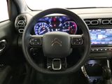 the interior of a car with a steering wheel and dashboard lights