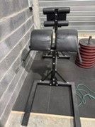 an image of a gym equipment set up in a garage