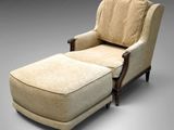 un fauteuil rembourré et un repose-pieds avec un coussin rembourré beige