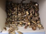 a box filled with lots of gold and silver items