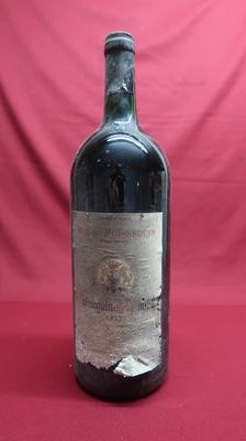 a bottle of wine that is sitting on a table
