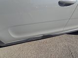a car that is parked on the side of the road
