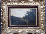 une peinture à l'huile représentant un paysage avec des arbres, dans un cadre doré sur fond bleu