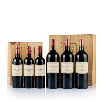 six bottles of red wine in a wooden box