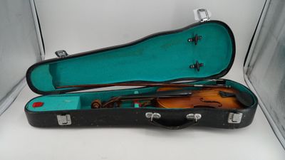 a violin case with a violin inside of it