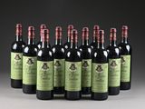 six bottles of red wine are lined up in a row