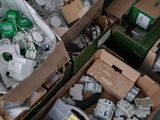 many boxes of electronic equipment sitting on the floor