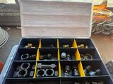 a tool box filled with various tools on a table