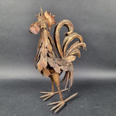 a sculpture of a rooster made out of wood