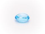a blue topazte gems on a white background