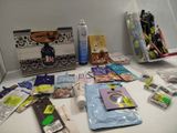 many items that are on the counter in the bathroom