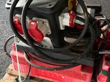 a picture of a portable air compressor sitting on a pallet
