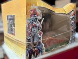 a cardboard box with a picture of a man riding a horse