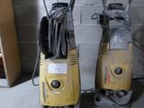 two vacuums sitting next to each other on the floor