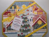 a close up of a box with a christmas tree on it