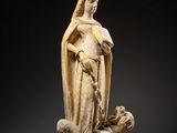 an image of a statue of a woman with a bird in her hand