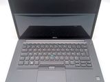 the dell laptop is open and ready to be used