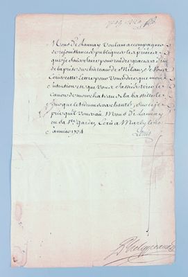 an old document with writing on it sitting on top of a table