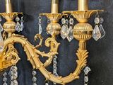 a wall light that is hanging on the wall