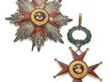 deux médailles et une couronne sur fond blanc