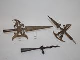 several different types of weapons are displayed on a white surface