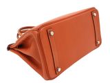 an image of a brown purse on a white background
