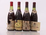 three bottles of wine are lined up on a table