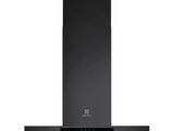 a black range hood with a light on top of it