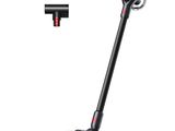a close up of a cordless vacuum cleaner on a white background
