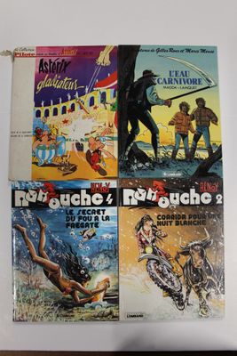 trois livres posés sur une table, dont l'un comporte l'image d'un homme à cheval et l'autre