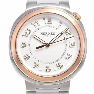 a silver and gold wrist watch with a white face