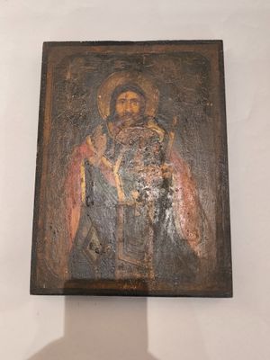 un vieux tableau représentant un homme barbu tenant une épée