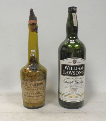 two bottles of wine sitting next to each other on a table