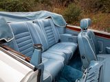 an image of the interior of a car with blue seats