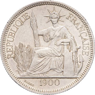 une image représentant une pièce d'argent sur laquelle figure la statue d'une femme assise sur une chaise