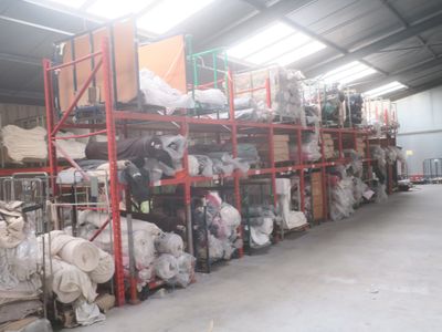a large warehouse filled with lots of different types of items