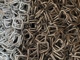 a box filled with lots of metal chains sitting on top of a table