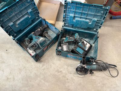 two tools in a blue case on the floor