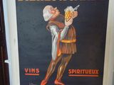une affiche représentant un homme tenant une bière à la main