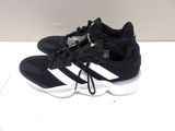 adidas shoes on a white surface with a white background