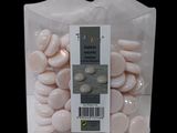 a bag of jelly beans in it on a black background