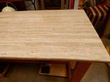 a table with a marble top in a room
