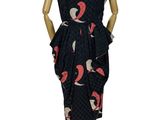 an image of a dress on a mannequin stand