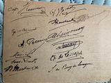 an old piece of paper with a bunch of signatures on it