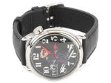 a black watch with red hands on a black leather strap