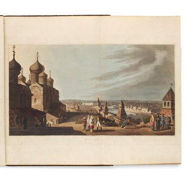 an old book with a picture of a city in the middle of it