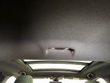 the interior of a car with a hole in the roof
