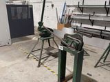 two machines that are sitting in a room